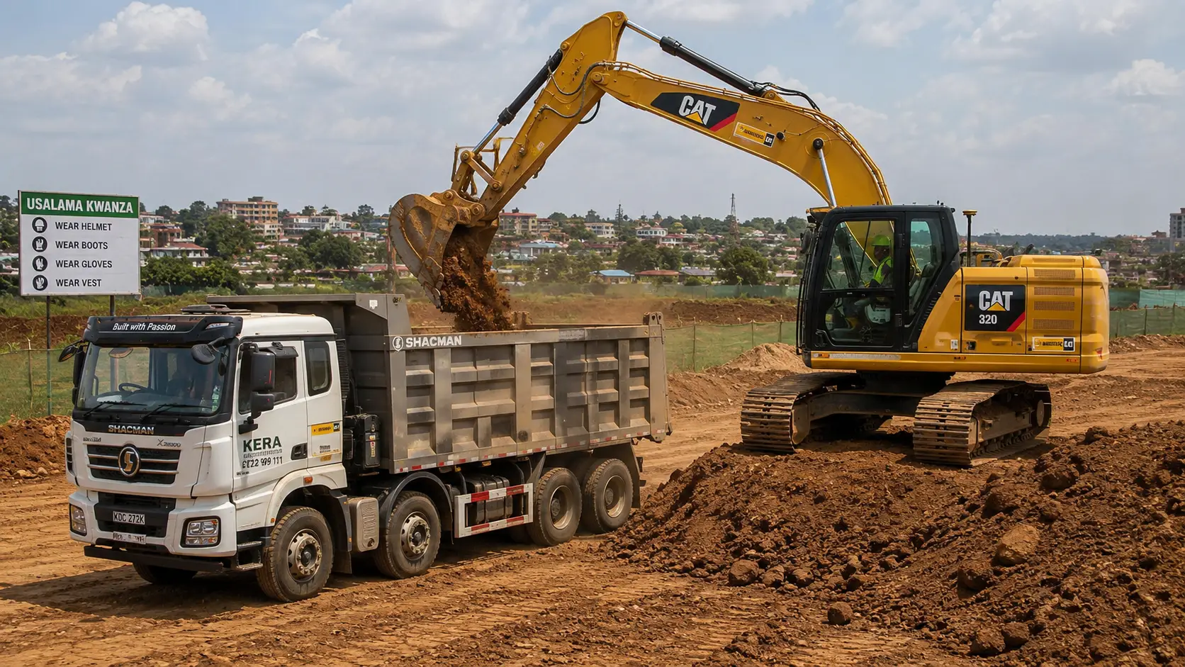An excavator and tipper truck combo working together on a construction site.