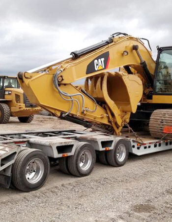 transporting-heavy-construction-machinery